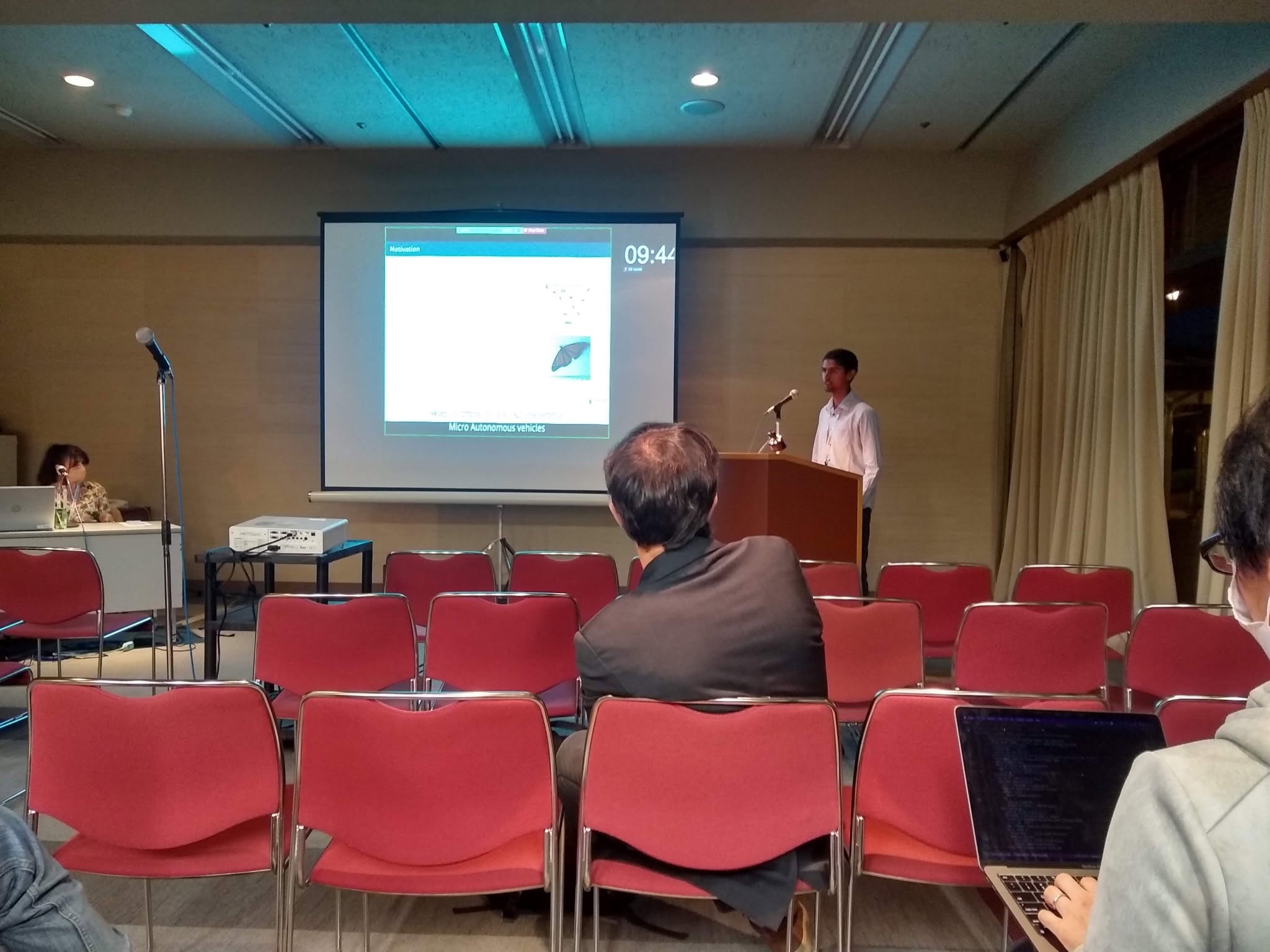 Photograph from the FDCL announcement: Tejaswi Presents Flapping-Wing Imitation Learning at IROS 2022