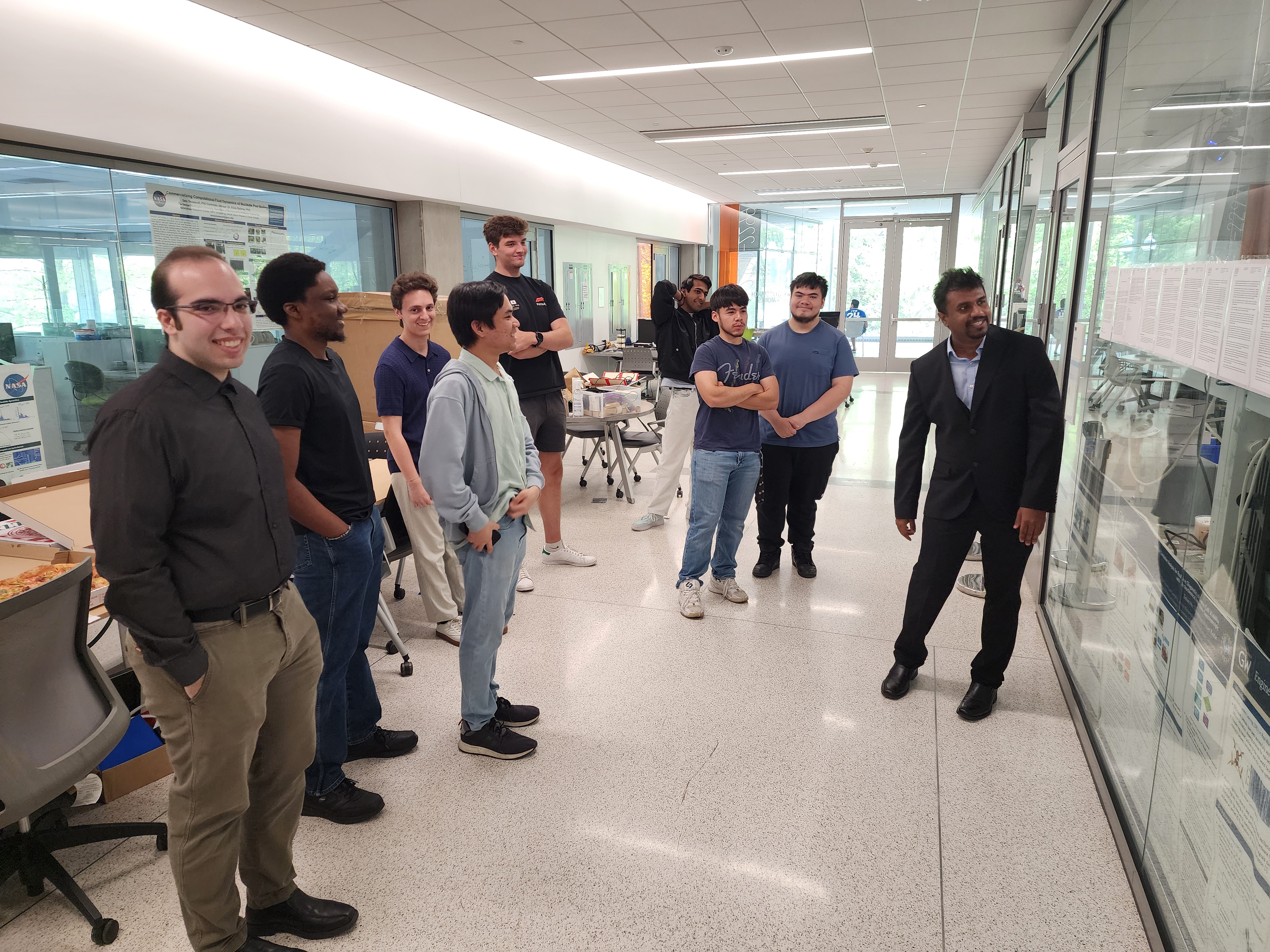 Maneesh and students gathered outside FDCL for the award celebration.